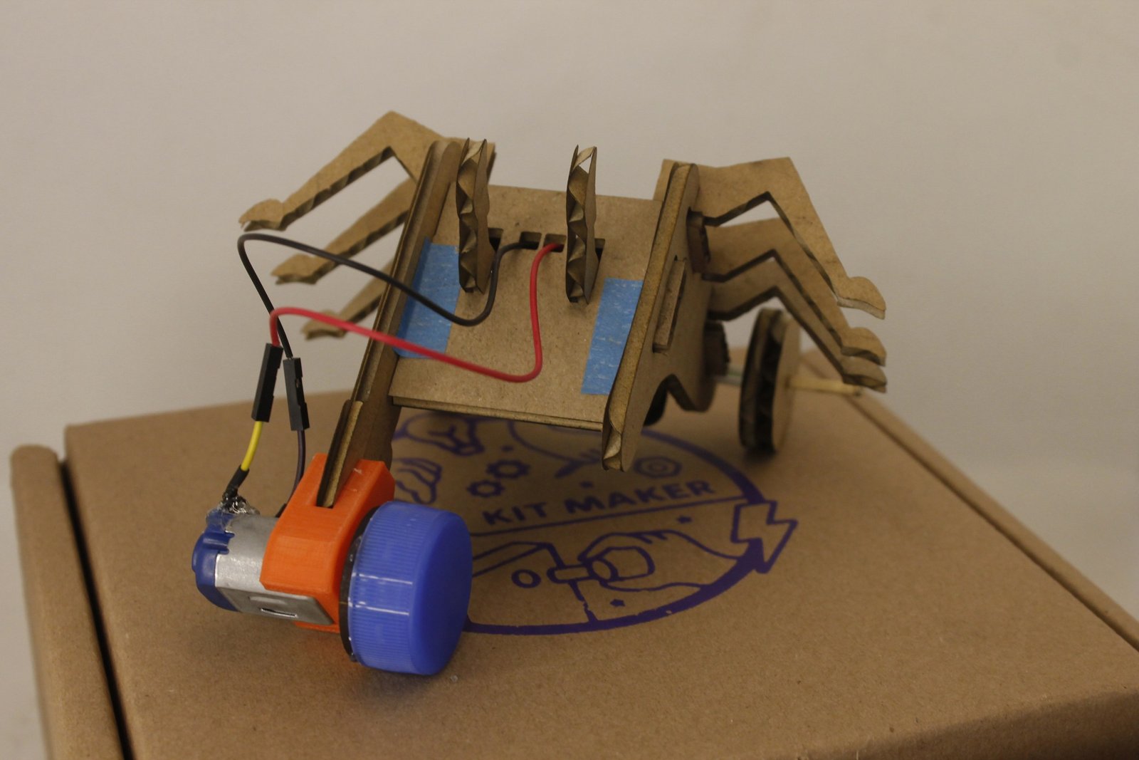 The robot on its box.